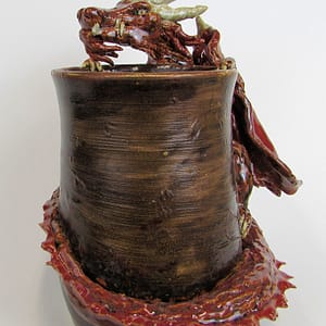 Snaggle toothed dragon vase