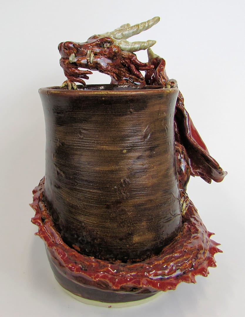 Snaggle toothed dragon vase